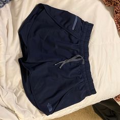 Darn Near Brand New! Size Medium - Navy With Light Blue Zipper Pocket. Blue Gym Shorts With Pockets, Blue Compressive Athletic Shorts, The North Face Sports Bottoms With Built-in Shorts, Blue 4-way Stretch Activewear Shorts, Blue Cotton Activewear With Built-in Shorts, North Face Shorts, Shorts Athletic, Athletic Shorts, Zipper Pocket