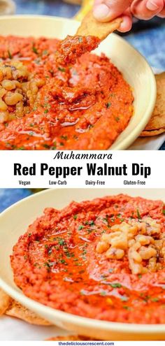 red pepper walnut dip in a white bowl with crackers on the side and hands dipping something into it