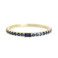 A luminously blue ring, set chock-full with sapphires. A very fancy stacking ring (yes please!), a subtle wedding band to sneak under your engagement ring, OR a wedding band and engagement ring, all in one! Financing options available in partnership with Affirm. Sapphire Eternity Ring, Sapphire Wedding Band, Cool Wedding Rings, Antique Wedding Rings, Ring Sapphire, Sapphire Band, Stones Jewelry, Pear Engagement Ring, Sapphire Wedding