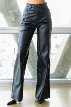 Indulge in cruelty-free chic with our Vegan Leather Wide Leg Pants. Crafted from high-quality PU, these pants showcase a modern edge with two front and back pockets, combining style and functionality. The zip-fly closure adds a touch of sophistication, making these pants a versatile addition to your wardrobe. Model is 5'8.5" and wearing a size 3Made In: ImportedFabric Contents: 100% PU Stretch fabric Non-sheer fabric Care Instructions: Dry Clean Only Size Measurement (inch): 0: (Waist), (Hips), Morgue Aesthetic, Rouge Cosplay, Wide Leg Leather Pants, High Waisted Leather Pants, Leather Wide Leg Pants, Rare Fashion, Pants Women Fashion, Black Leather Pants, Leather Pant