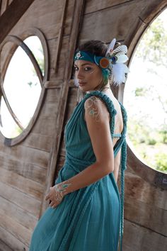 Tribal Green Boho Dresses for Women can be seen as a piece of art connecting with nature. A wild elegant woman seeking adventure is to truly set free in this stylish. The Braids of this turquoise bridesmaid dress form its shape, you can play around and change the style and sizing so it can be a plus-size dress as well. SIZING One size adjustable with braids size fits XS / S / M / L Here is the instruction how to do braids of this dress: https://youtu.be/CCRGkrKOR_c Here is a brief instruction ho Bohemian Turquoise Maxi Dress For Summer, Turquoise Maxi Festival Dress, Turquoise Sleeveless Bohemian Dress, Bohemian Sleeveless Turquoise Dress, Turquoise Bohemian Maxi Dress, Turquoise Bohemian Boho Dress For Summer, Turquoise Bohemian Maxi Dress For Festivals, Flowy Bohemian Turquoise Dress, Turquoise Bohemian Dress For The Beach