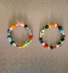 If mushrooms are your vibe, then these mushroom y2k beaded bracelets will be the perfect match for your aesthetic! Choose from flowers, smiley faces, and mushrooms or go towards a more edgy look with mushrooms, eyes, smiley faces, and dice.  Check out our kandi bracelet section for more unique designs✨.  Product info: *Stretchy *Mushrooms are glass *Every bead is randomly selected  If you have any questions, please don't hesitate to send us a message! We are friendly:) Visit our official website: www.yeetincolorboutique.com and follow us on Instagram: @yeetincolorboutique Handmade Y2k Style Bracelets Gift, Adjustable Y2k Jewelry With Colorful Beads, Adjustable Colorful Beaded Y2k Style Jewelry, Y2k Style Adjustable Colorful Beaded Jewelry, Y2k Style Beaded Bracelets As Gift, Adjustable Beaded Y2k Jewelry, Handmade Adjustable Y2k Beaded Bracelets, Adjustable Y2k Style Jewelry With Round Beads, Cottagecore Bracelet