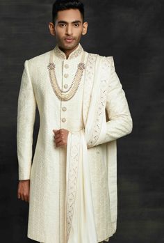 Traditional Fit Sherwani For Wedding And Diwali, Wedding Sherwani For Diwali, Traditional Fit Bandhgala For Wedding, Designer Traditional Wear With Cutdana For Reception, Embroidered Traditional Fit Sherwani For Wedding, Designer Bandhgala With Dupatta For Reception, Designer Traditional Wear With Chikankari Embroidery, Traditional Fit Bandhgala With Cutdana For Wedding, Traditional Fit Sherwani For Eid Wedding