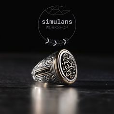 Crafted with an artful touch, the "Timeless Wisdom Oval Signet Ring" is a sophisticated piece that encapsulates the essence of resilience and the enduring human spirit. Embracing the intricate art of engraving, this ring boasts a central motif adorned with the uplifting inscription 'buda geçer yahu', a Turkish adage meaning 'this too shall pass' - a timeless reminder that all experiences, good and bad, are fleeting. The sides of the ring are embellished with fine micro gemstones, adding a touch Luxury Silver Rings With Etched Details, Luxury Signet Ring With Intricate Design As Gift, Luxury Oval Signet Ring With Intricate Design, Oval Silver Signet Ring For Promise, Oval Engraved White Gold Ring For Ceremonial Occasions, Oval White Gold Engraved Ring For Ceremonial Occasions, Oval White Gold Engraved Ceremonial Ring, Symbolic Oval Engraved Ring For Ceremonial Occasions, Oval Engraved Ceremonial Rings