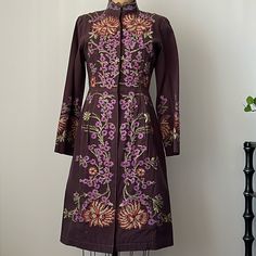 Beautiful Vintage Embroidered Floral Duster Coat Maroon/Purple/Brown Color With Gorgeous Multicolor Floral Embroidery!! Excellent Like New Condition. This Is Such A Knock Out Coat!! Hook And Eye Front Closure With Two Front Hidden Pockets. Fits Xs-Medium. Measurements Armpit To Armpit Across Laying Flat: 18” Armpit To Wrist: 18.5” Length: 42” Waist At Seam Across Flat: 15” Follow Me On Social Mediaig: @Dreamonromeo Chasing Unicorns Free People Doen Ralph Lauren Etro Emilio Pucci Floral Duster, Chasing Unicorns, Maroon Purple, Emilio Pucci, Vintage Jacket, Green And Purple, Floral Embroidery, Brown Color, Duster Coat