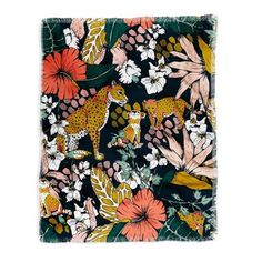 a square scarf with leopards and flowers on it