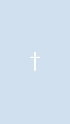 a white cross on a light blue background