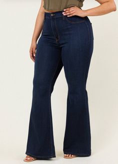 Plus Size Dark Wash High Rise Flared Jeans These Plus Size Dark Wash High Rise Flared Jeans are the perfect addition to any wardrobe. With a high rise and a flattering flared leg, these jeans are the most popular style for women of all shapes and sizes. They are designed to contour your body for a slimming silhouette and feature a dark wash for a timeless look. Whether you’re dressing up or dressing down, these jeans will have you looking and feeling your best. 49% Rayon/32% Cotton/17% Polyester Mid-rise Dark Wash Flare Jeans For Summer, Elegant Mid-rise Dark Wash Flare Jeans, Dark Wash High-waisted Flare Jeans, Dark Flare Jeans, Mid-rise Dark Wash Recycled Denim Flare Jeans, Cheap Full-length Dark Wash Flare Jeans, Flare Jean Outfit, Flare Jeans Style, Women's Plus Size Jeans