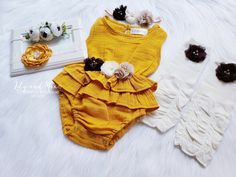 "MUSTARD RUFFLE ROMPER Elegant super soft ruffled stretchy waist romper embellished with beautiful quality chiffon flower with jewels and pearls. {use} *Birthday, *Baptism, *Easter, *special occasions, *picture props, *weddings, *for fun! Available dress sizes below: 0-3 months 3-6 months 6-12 months 12-24 months CHOICE OF HEADBANDS-- #1 #2 #3 Beautiful matching headbands adorned with jeweled flower and can be also made on hard headband or alligator clip. If you need hard headband or on alligato Fitted Bodysuit For First Birthday In Summer, Fitted Yellow Ruffle Jumpsuits And Rompers, Yellow Fitted Jumpsuits And Rompers With Ruffles, Yellow Bubble Romper With Ruffles For Spring, Fitted Bubble Romper With Ruffles For Cake Smash, Fitted Ruffle Bubble Romper For Cake Smash, Cute Fitted Yellow Bubble Romper, Cute Yellow Bubble Romper With Ruffles