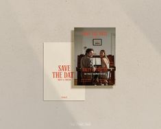 a couple sitting on a bench in front of a white wall with the words save the date printed on it