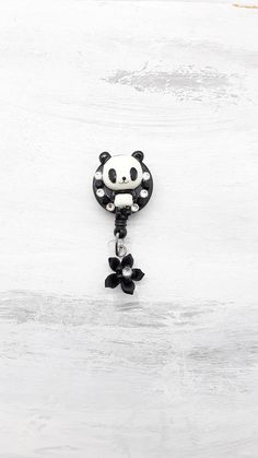 This  retractable Panda Bear badge holder would make a perfect gift for hospital staffs, doctors, students, teachers, child care providers, office workers, and anyone who adorns keys, identification, or swipe cards. This Retractable ID badge holder is great in holding your work ID, school ID. Great in holding small accessories such as scissors, locker keys etc. This super cute Panda Bear badge , the retractable cord extends approximately 32 inches.  Material is made of Resin.    No returns or ex Nursing Badge Reel, Nursing Badge, Swipe Card, School Id, Nurse Badge Holders, Retractable Id Badge Holder, Hospital Staff, Nurse Badge Reel, Nurse Badge