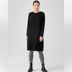 Nwt Eileen Fisher Stretch Jersey Knit Crew Neck Dress Boxy Fit, Calf Length Easy And Elevated. A Crew Neck Dress With Long Sleeves And Zippered Side Slits At The Hem. In A Body-Skimming Jersey Knit That Dresses Up Or Down. A Generous, Boxy Fit That Drapes Away From The Body To Create Movement. Tencel Lyocell Fiber Is Made From Responsibly Harvested Trees. We Design Our Line As A System Of Simple Shapes And Signature Fits So You Can Easily Find The Options That Work For You. Graphite Only Availab Lantern Dress, Taupe Sweater, Eileen Fisher Dress, Crew Neck Dress, Handkerchief Hem Dress, Quarter Sleeve Dress, York Dress, Black Crewneck, Dress With Long Sleeves