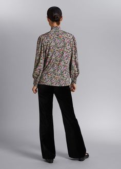 Mock neck blouse featuring draped gathers at the neck, shoulders and sleeve.Invisible zip closure at the back of blouse.Blouse measurements: 59cm / 23.2" Floral Print Stretch Tops For Work, Stretch Floral Print Tops For Work, Mock Neck Blouse, Chic Blouses, Simply Chic, Invisible Zip, Fashion Story, Shop Blouses, Feminine Style