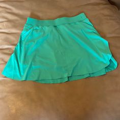 Super Cute Green Tennis Skirt! New Never Worn! Comes With Built In Shorts! Size Small Casual Green Skirt With Short Inseam, Casual Green Swim Skirt With Built-in Shorts, Casual Green Short Swim Skirt, Casual Short Green Swim Skirt, Casual Green Mini Swim Skirt, Casual Green Lined Swim Skirt, Casual Green Swim Skirt For Spring, Green Tennis Skirt, Tennis Skirt