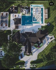 an aerial view of a house with a swimming pool