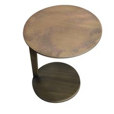 a round metal table with a circular base on it's side, against a white background