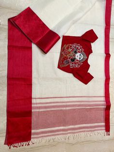 This pure cotton dhonekhali saree with broad satin border in one side and narrrow on other side is a must for either Durga puja or Poila Baishakh or for any special occation . Saree is without blouse but you can make it gorgeous by adding my  embroidery Ma Durga ( my own creation , this is my ancestor's house Durga ma face ) blouse . This is machine embroidery and on pure fine cotton .  Fall pico complimentary with tassels . saree : 5.5 mt Blouse : Pure Fine Cotton ( Arvind ) can be adjust ( eas Tassels Saree, Dress Designs For Stitching, Durga Ma, Ma Durga, Wedding Gift Baskets, My Ancestors, Durga Puja, Dress Designs, Pure Cotton