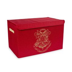 a red storage box with a gold emblem on the front and bottom, sitting against a white background