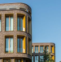 a large building with many windows and balconies