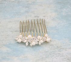 Wedding Hair Comb, Bridal Hair Comb, Crystal Bridal Comb, Silver Wedding Hair Comb, Crystal Headpiece, Bridal Side Comb It's definitely on the smaller side for formal hair combs, but, if you don't want anything too large, or had too many parts branching out everywhere. It's perfect for a wedding- simple, but not understated, unique but not costume-like! This tiny beautiful and delicate silver tone hair comb is made with a clear rhinestone and Swarovski pearl. Perfect for a special occasion or to Comb Hair Clip, Gold Wedding Hair Piece, Bridesmaid Hair Comb, Gold Bridal Hair Comb, Hair Comb Clips, Formal Hair, Gold Hair Comb, Side Comb, Wedding Simple