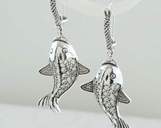 925 Sterling Silver Fish Dangle Earrings Solid Silver - Etsy Elegant Jewelry With Fish Hook For Gift, Elegant Sterling Silver Earrings With Fish Hook, Silver Fish-shaped Earrings With Ear Wire, Ocean-inspired Sterling Silver Dangle Earrings, Handmade Silver Fish-shaped Earrings, Silver Fish-shaped Sterling Silver Earrings, Sterling Silver Fish-shaped Jewelry, Nickel-free Silver Fish-shaped Earrings, Silver Sterling Fish-shaped Earrings