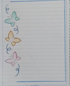 an open notebook with butterflies drawn on the side and lined paper in front of it