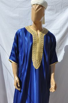 Kaftan For Men Beautiful moroccan kaftan for men gift Beautiful moroccan kaftan in cotton for men. This moroccan clothing is handmade in soft fabric cotton. This kaftan is very pleasant to wear mainly in summer, at the beach, after a spa, indoor, outdoor, at a party... Very fast to wear, not stick to the skin, this kaftan is a really must have clothing. - Cotton - embroidery - One size - Machine washing return policy I check myself each product and sell only the best quality products in any case Traditional Short Sleeve Kaftan For Eid, Traditional Tunic Kaftan For Diwali, Traditional Short Sleeve Kaftan For Ceremonies, Traditional Short Sleeve Kaftan For Festive Occasions, Traditional Short Sleeve Kaftan, Traditional Short Sleeve Thobe For Eid, Eid Traditional Tunic Kurta, Eid Tunic Kurta For Traditional Ceremonies, Traditional Blue Thobe For Eid