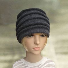 This is elegant woman's felt beanie hat. It is soft and lightweight. This hat is very comfortable and easy to wear. It is a very stylish women's hat that is going to keep you warm in cold days, yet you will look amazing. You can put it on with classic and casual style clothing, so this beautiful hat is very universal. Composition: 100% woolOne size to fit average woman's head.CARE: Hand wash in lukewarm water.  Do not dry in the dryer!Air dry over a balloon or small bowl to retain hat shape and Winter Felt Brimmed Cloche Hat, Brimmed Felt Cloche Hat For Winter, Winter Felt Cloche Hat With Brim, Winter Felt Hat, One Size Fits Most, Winter Felt Hat One Size Fits Most, Winter Felt Hat One Size, Gray Winter Cloche Hat With Curved Brim, Winter Felt Beanie Hat, Winter Felt Cloche Hat With Short Brim