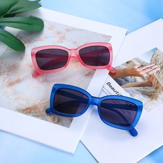 This eye-catching frame has two bold colors, blue and pink, paired with grey lenses, surely making a splash on your daily look. Whether on the beach, on street, or on a drive, these sunglasses guarantee you a cool and comfortable experience. Fashionable and wearable, the style will endow you with extra charm.Frame Shape: RectangleFrame Color: BlueFrame Material: PlasticLens Color: GreyLens Material: Lens Width: 53 mmBridge Width: 17 mmTemple Length: 140 mmUV Protection: UV400Polarized: No Blue Plastic Sunglasses With Uva Protection, Blue Sunglasses With Uva Protection For Pool, Blue Square Frame Sunglasses With Tinted Lenses, Blue Tinted Sunglasses For Pool, Blue Polarized Plastic Sunglasses, Casual Blue Sunglasses For Pool, Blue Gradient Lens Plastic Sunglasses, Trendy Blue Sunglasses For Pool, Summer Beach Sunglasses With Square Frame