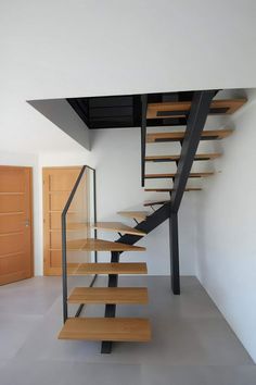 the stairs are made of wood and metal