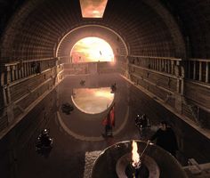 the inside of a tunnel with several people in it