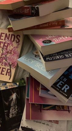 a pile of books sitting on top of each other