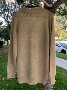 Gold sparkle shimmer vintage sweater perfect for the holidays, New Year's Eve or for literally any day. Marked Gardy size M. From the 1980s/early 90s. Very good condition. The sweater so shiny and so festive! Gold Crew Neck Sweater For Fall, Gold Long Sleeve Sweater, Gold Knit Winter Sweater, Gold Knit Sweater For Winter, Sparkle Sweater, Womens Pullover Sweaters, Sweater Christmas, Early 90s, Pullover Sweater Women