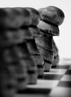 black and white photograph of chess pieces