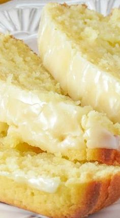 two pieces of bread sitting on top of a white plate