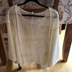 Open Weave Off White Sweater With Bell Sleeves. Thick Seams Add Detail To Front And Back. Width: Top 22.5” And 26” Bottom, Sleeve Width: 6” Top Of Arm And 8.25” At Bottom Of Sleeve, Length: 23.5” Front And 26” Back (Slightly Longer In Back And Wider At Bottom). New Never Worn. White Open Knit Blouse For Summer, Spring Open Knit Blouse For Beach, White Open Knit Blouse For Spring, Off White Sweater, Hollister Tank Tops, Yellow Floral Top, Mesh Cardigan, Pink Sleeveless Blouse, Floral Long Sleeve Shirt