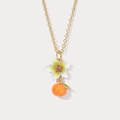 Our Orange Blossom Necklace, a vibrant addition to your summer wardrobe. This delightful orange fruit necklace features a charming orange charm, made from 18K gold-plated brass. The rich orange enamel brings the charm to life, capturing the essence of a perfectly ripe citrus fruit. Whether you're seeking a pop of color Women Gold Pendant, Necklace For Women Gold, Gold Necklace For Women, Fruit Necklace, Orange Necklace, Simple Gift Wrapping, Fruit Jewelry, Positive Mood, Golden Necklace