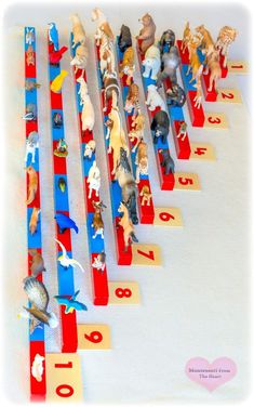 many toy figurines are lined up on top of each other in the shape of numbers