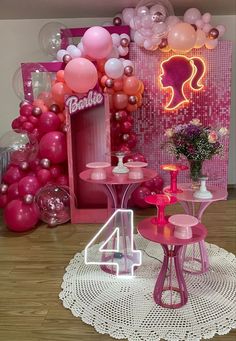 a room filled with balloons and decorations for a birthday or baby's first birthday