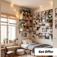 a bedroom with lots of pictures on the wall