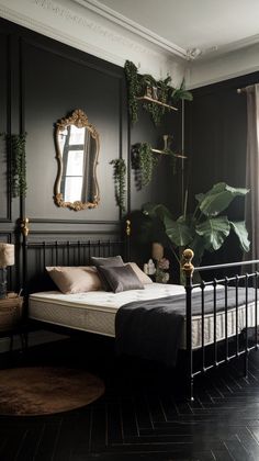 a bedroom with a bed, mirror and plants on the wall