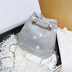 Product Description: Fashion Diamond Women Chain Shoulder Purses And Handbags Crystal Clutch Evening Bucket Bags Rhinestone Party Crossbody Bag Material: polyester Color：as picture About color： As youl know, the different computers display colors differently, the color of the actual item may vary slightly from the following images. About size: 1. Please check the size chart carefully before you buy the item, if you don't know how to choose size, please contact our customer service 2. Please allo Trendy Mobile Phone Evening Bag For Parties, Sparkling Crystal Bags For Party, Silver Shoulder Bag For Party, Silver Mobile Phone Shoulder Bag For Party, Silver Mobile Phone Bag For Parties, Silver Rhinestone Shoulder Bag For Night Out, Evening Bags With Crystal Material, Trendy Rhinestone Bags For Party, Trendy Party Bags With Rhinestones