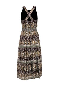 Take the floral trend into autumn with this dress from Sea NY! A rich brown and yellow floral print makes this bohemian-inspired piece perfect for those transitional months. Pair with sandals and a hobo bag, or wear with booties and a jean jacket on those chilly fall days. Size 4 Shell: 100% Viscose Lining: 100% Polyester Concealed side zipper Lined Maxi, tiered silhouette Scoop neckline Sleeveless Crisscross design on back Floral print design Bust 34" Waist 30" Shoulder to hem 53" Chic Brown Floral Print Maxi Dress, Flowy Brown Printed Maxi Dress, Brown Printed Maxi Dress For Summer, Hippie Brown Floral Print Dress, Sleeveless Brown Floral Print Maxi Dress, Sleeveless Brown Floral Maxi Dress, Brown Floral Print Sleeveless Maxi Dress, Brown Floral Print Maxi Dress For Spring, Brown Floral Print Maxi Dress For Vacation