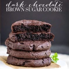 chocolate brownie cookies stacked on top of each other