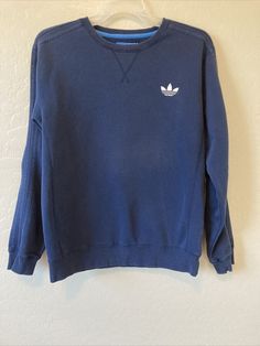 Adidas Casual Sweatshirt For Sports, Casual Blue Sweatshirt For Sports, Casual Crew Neck Sweatshirt With Three Stripes, Casual Blue Sports Sweatshirt, Casual Three Stripes Crew Neck Sweatshirt, Adidas Casual Sports Sweatshirt, Adidas Casual Sweatshirt For Fall, Adidas Casual Sweatshirt With Three Stripes, Casual Adidas Sweatshirt With Three Stripes