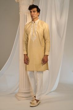 Yellow longline Nehru jacket with contrasting floral pattern aari tilla embroidery. Comes with embroidered placket kurta and pant. - Aza Fashions Designer Kurta With Resham Embroidery And Stand Collar, Stand Collar Kurta With Resham Embroidery, Designer Resham Embroidery Kurta With Stand Collar, Traditional Spring Nehru Jacket With Dabka, Spring Wedding Nehru Jacket With Dabka, Bandhgala With Chikankari Embroidery For Eid, Eid Bandhgala With Chikankari Embroidery And Stand Collar, Ceremonial Bandhgala With Embroidered Border For Eid, Traditional Kurta With Chikankari Embroidery And Stand Collar