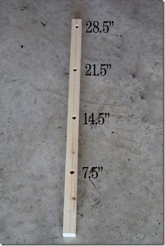 a ruler is on the ground with measurements