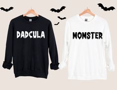 MOMSTER and DADCULA Matching Halloween Shirts, Momster Shirt, Dadcula Shirt, Mom Halloween Shirt, Dad Halloween Tee, Mom Halloween Tee, Couples Halloween Shirts,  * High quality and super soft, comfortable shirt. Made with top-of-the-line vinyl and pressed with a professional grade heat press. * Please check all color and size charts before place the order. Since all shirts are custom made based on your selection, I don't accept return or exchange unless there is an issue with your order. *We're Pre-shrunk Long Sleeve Shirt For Halloween, Long Sleeve Shirt With Letter Print In Spooky Style, Spooky Long Sleeve Shirt With Letter Print, Customizable Black Halloween Top, Halloween Long Sleeve Shirt With Letter Print, Funny White Long Sleeve Shirt, Long Sleeve Halloween Shirt, Black Long Sleeve Halloween Shirt, Spooky Long Sleeve Shirt For Halloween