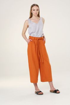 BARI pants have zipper closure and belt (can be removed), they are elegant and comfortable to wear in any occasion. Wear with sandals or high heels. Colors in pictures Powder Blue & Tangerine Combined with EVA top in French Gray color MILA top in Beige color --------SIZING GUIDE BODY-------- SIZE XS Chest 84 cm / 33.1 in Waist 68 cm / 26.8 in Hip 92 cm / 36.2 in SIZE S Chest 88 cm / 34.6 in Waist 72 cm / 28.3 in Hip 96 cm /37.8 in SIZE M Chest 92 cm / 36.2 in Waist 76 cm / 29.9 in Hip 100 cm Chic Capri-length Pants, Chic Capri Pants With Pockets, Chic Summer Culottes With Belt Loops, Versatile Pants With Belt Loops For Spring, Summer Workwear Culottes With Belt Loops, Versatile Belted Trousers, Versatile Belted Bottoms For Spring, Spring Straight Culottes With Belt Loops, Versatile Belted Bottoms For Summer