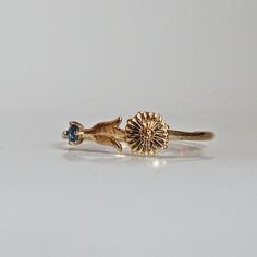 Our special collection of birth flower rings are inspired by the love of wearing something meaningful. Each birth flower is adorned with that month's birthstone. September's birth flower is Aster and the birthstone is blue sapphire. Materials: - 14K solid gold - 2mm natural blue sapphire - 1.1mm band thickness ** This item is specially made for you. Please allow 1-2 week lead time.  Shipping: Domestic: Free standard shipping via USPS  International: $17 for international standard shipping. $10 t Blue Birth Flower Jewelry For Anniversary, September Aster, September Birth Flower, Aster Flower, Dainty Diamond Ring, Flower Rings, September Birthstone, Birth Flower, Natural Blue Sapphire